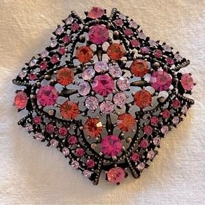 Gorgeous Graziano brooch with multicolored rhinestones.